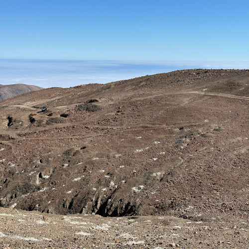 View towards the SW of structures worked by old miners.